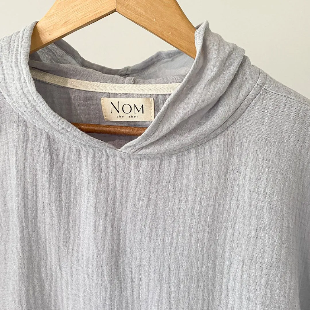 NOM the label | Poncho